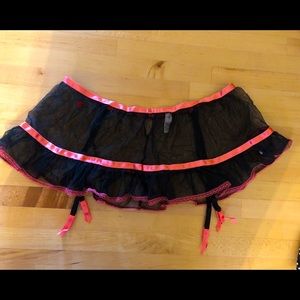 Victoria’s Secret pink and black garter skirt.